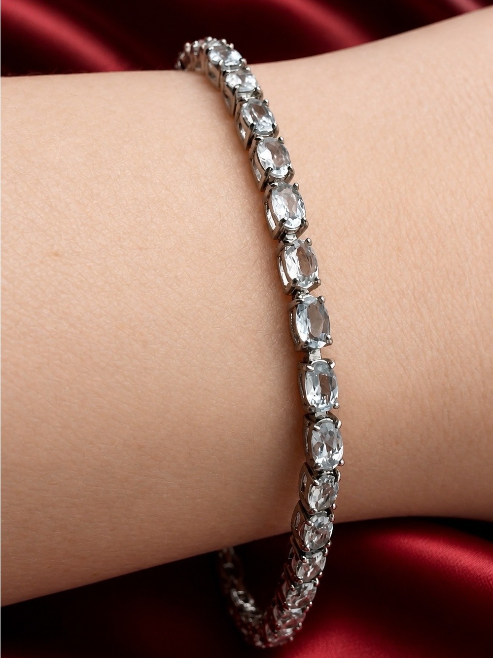 Aquamarine tennis bracelet set in rhodium over 925 Sterling Silver. Brand new